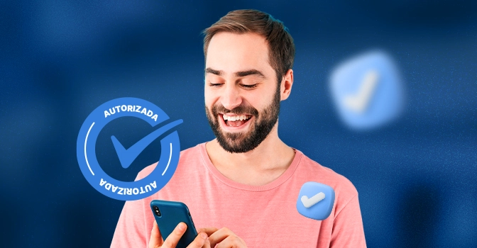 Imagem mostra homem sorrindo ao utilizar um celular rodeado por selos de verificado